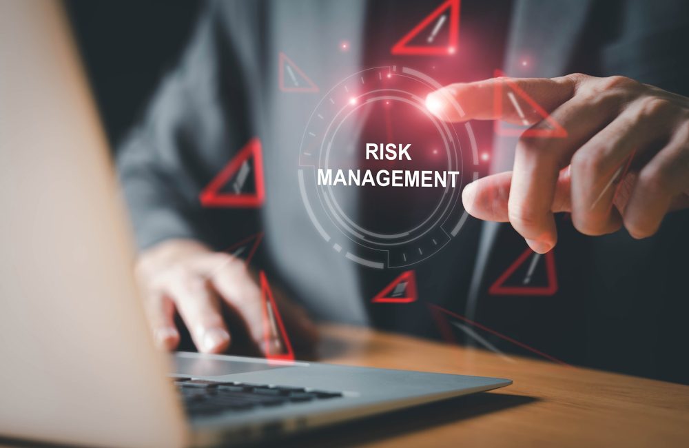 close up with hand of business person identify danger risk with AI among normal incident. Risk management concept for business and personal planning for risk mitigation with information and decision