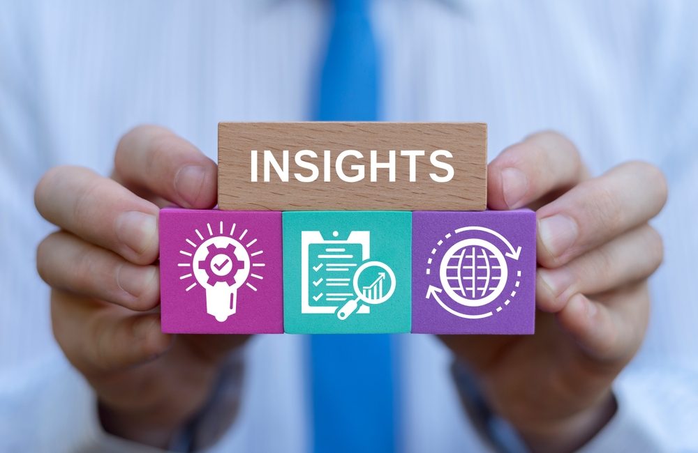 Data,Insight.,Business,Person,Holding,Color,Blocks,Sees,Text:,Insights.